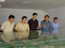 2004年6月 济南市副市长刘善鹏、历城区区长许强莅临指导盖世物流片区整体规划